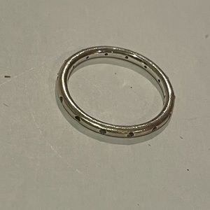 Pandora ring with diamond around